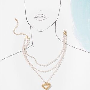 Anthropologie Gold and Cream Heart Necklace